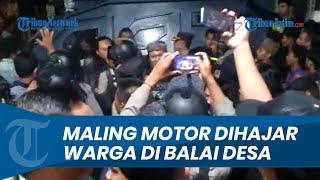 GREGETAN, Maling Motor di Gresik  Dihajar Warga di Balai Desa, Pelaku Diamankan Kendaraan Rantis