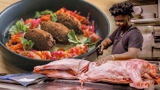 A Day at Austin s Top Caribbean Restaurant Cooking Whole Wild Boar   On The Line   Bon Appétit