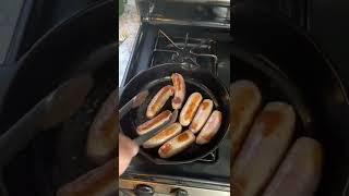 Cooking Sausages in a Cast Iron Pan