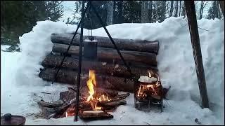 Dinner in my snow shelter out in the mountains of the Adirondacks