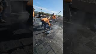 Old-school hot mopping  #shorts #roof #roofer #roofing #roofershelper #commercialroofing #flatroof