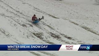 Snow brings joy and routine to Iowans amid winter weather