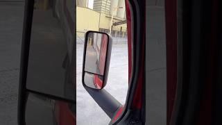 Rookie truck driver getting help from a fellow truck driver while backing his 53ft trailer
