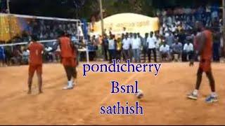 Pondicherry Bsnl player sathish attacking volleyball match.