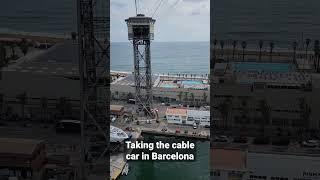 Taking the cable car in Barcelona.