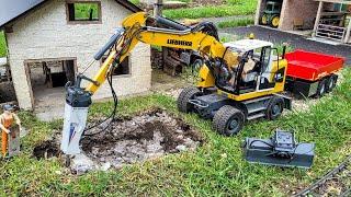 Broken pool demolition and backfill. RC wheeled excavator Liebherr A918 trailer, Mercedes Sprinter.