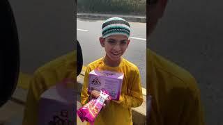 A young boy selling Bulbulay wafers to nabeel how cute is that ️