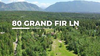 Explore 80 Grand Fir Lane: A Montana Retreat with Stunning Views on 20 Acres of Mountain Paradise!