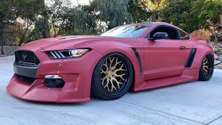 The world’s craziest widebody Mustang gets the meanest REwrap color.