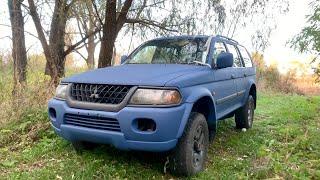 Mitsubishi Pajero sport 1 painted blue after body restoration