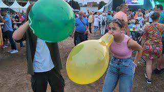 Girls blowing balloons at Public Festival (Part 2) (Preview)