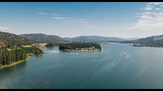 Aerial Footage Of A Lake Surrounded By Mountain