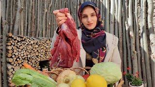 Millennial traditional Iranian food with meat in a rural house || (Ghormeh Sabzi)