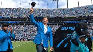 Panthers Hall of Honor inductee Jordan Gross hits the Keep Pounding drum