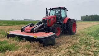 Front and rear disc mower on Kubota M7