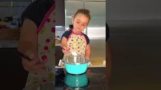 3-year-old making Banana Blueberry Muffins