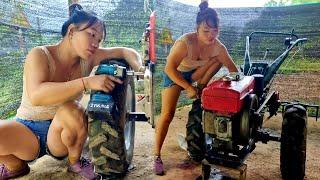 Girl repairing diesel engine, Installing it on agricultural tractor - Bàn Thị Ta