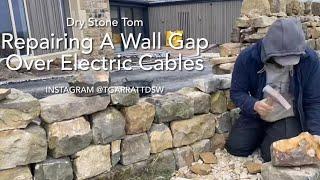 Dry Stone Walling - Repairing A Wall Gap Over Electric Cables