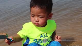 Baby On the Beach Enjoying the Summer