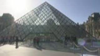 Ex-leader of Louvre charged with money laundering