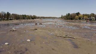 Lake vanishes after Michigan dam fails during record flooding