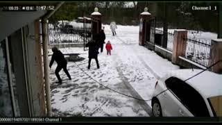 Boy playing snow on road gets crashed by car