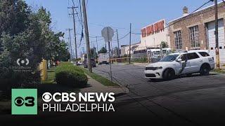 Philadelphia police looking for 2 men accused of robbing a Brinks truck in Port Richmond