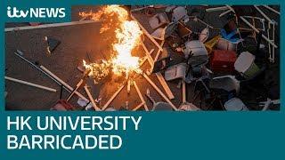 Students armed for battle with police at Hong Kong university | ITV News