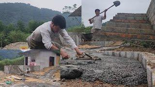 Pour concrete and use stream rocks to landscape the walkway.