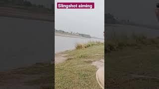 Slingshot aiming at river|slingshot hunting|Slingshot shooting at river|Slingshot Target Hitting|