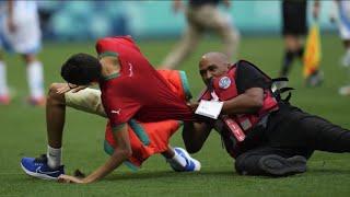 Morocco fans rush field during Olympic soccer opener, forcing suspension in match vs Argentina