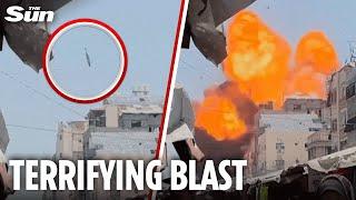 Moment Israeli airstrike takes out building in packed Gaza street in MASSIVE explosion