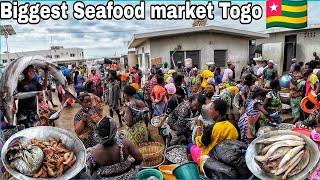 Largest seafood market in lomé. Buying and cooking Delicious Fish and Attieké in Togo west Africa