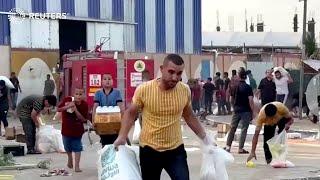 Gazans storm UN warehouse for food supplies