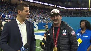 Olympic champion snowboarder Nick Baumgartner talks at Lions game