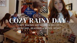 cozy rainy night vlog: fall baking, halloween decor, skincare routine, read with me, + movie night