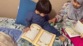 Little kid trying to recite Quran