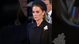 Princess Kate "stunning"look in black dresses & pearl leaf brooch.