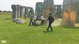 Climate activists cover Stonehenge in orange paint, 2 arrested