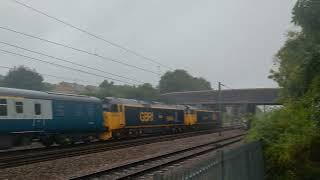 Two class 50s thunder through a very soggy Stevenage.