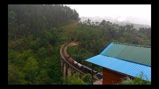 Visit Sri Lanka - Ella Nine Arch Bridge - Train caught with rain