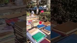 Walk through the streets of Bishkek. People sell old books.