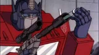 Optimus Prime Uses Megatron to Shoot The Insecticons