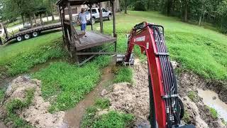 Dredging The Cove Of A Pond