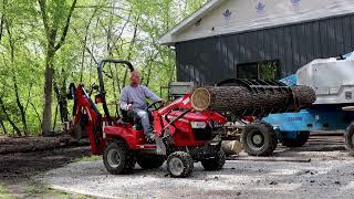 Massey Ferguson GC1725M Sub-Compact Tractor with Grapple at Saw Mill