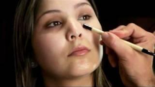 Eduardo Ferreira from Bobbi Brown Step 2 applying concealer