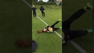 Alex Morgan tries goalkeeping from Ashlyn Harris'sSquor