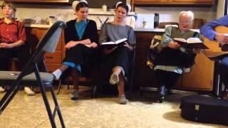 Understand by and by, Amish youth singing for great-great- grandmother.