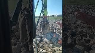 Rockland Krypto Klaw sorting concrete on a Volvo 160E excavator