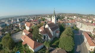 The Evangelical Church and the Violin Monument in Reghin, Romania